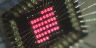 What role do optical components play in ToF cameras?